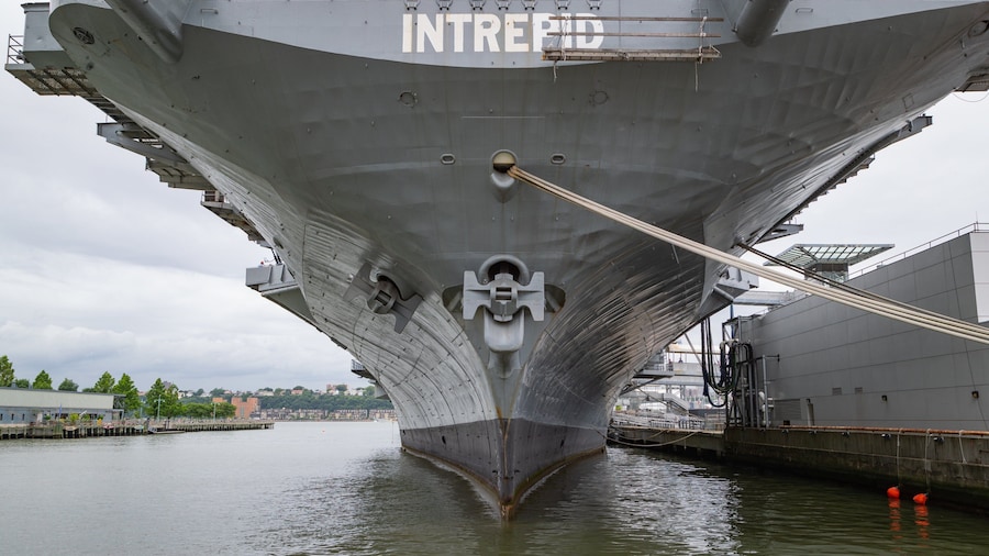 Intrepid Sea, Air and Space Museum featuring a marina, military items and signage