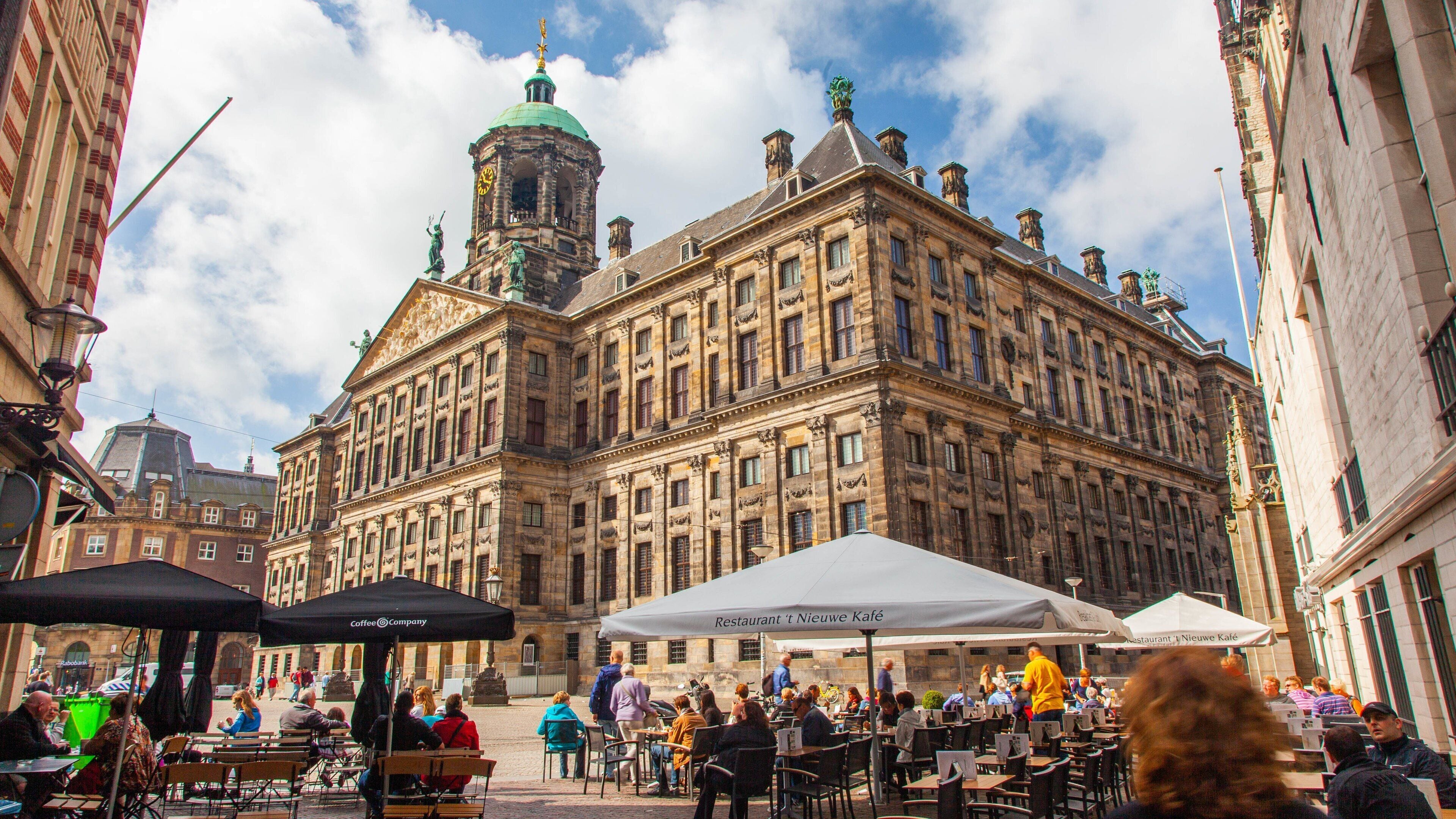 Dam Square featuring a square or plaza, outdoor eating and heritage architecture