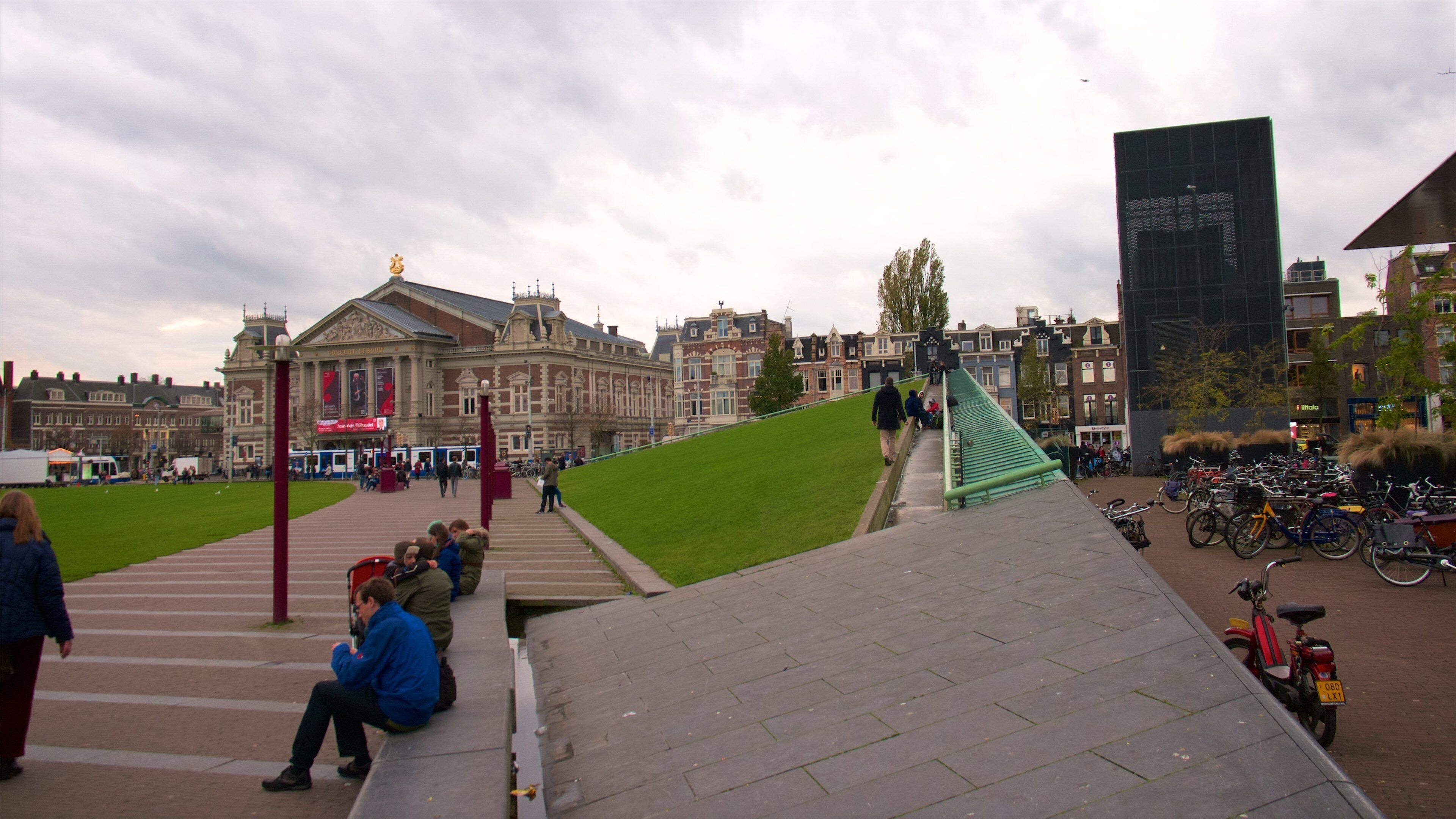 Museum Square which includes street scenes as well as a large group of people