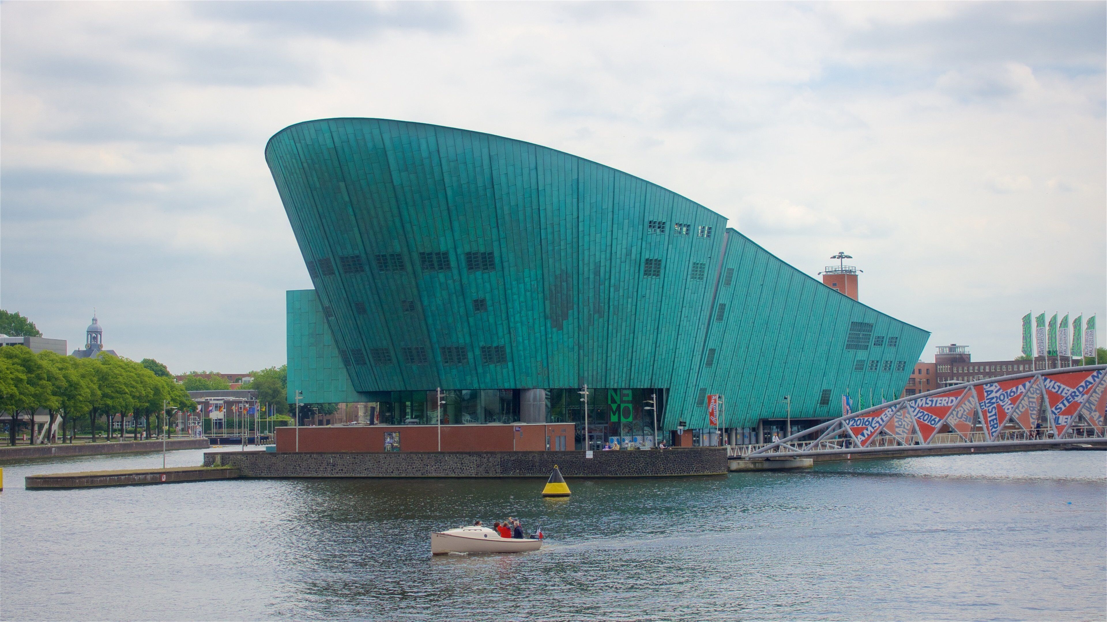Nemo Science Museum which includes a bridge, a river or creek and modern architecture