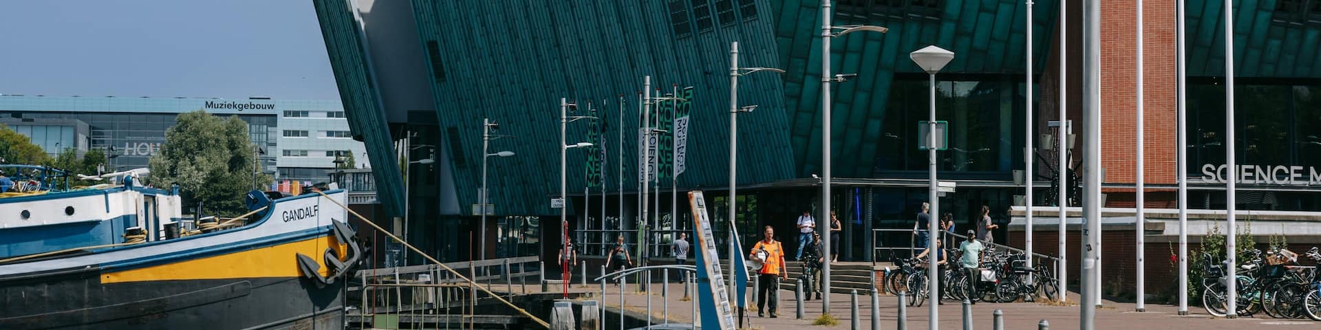 Nemo Science Museum featuring modern architecture and a bay or harbor