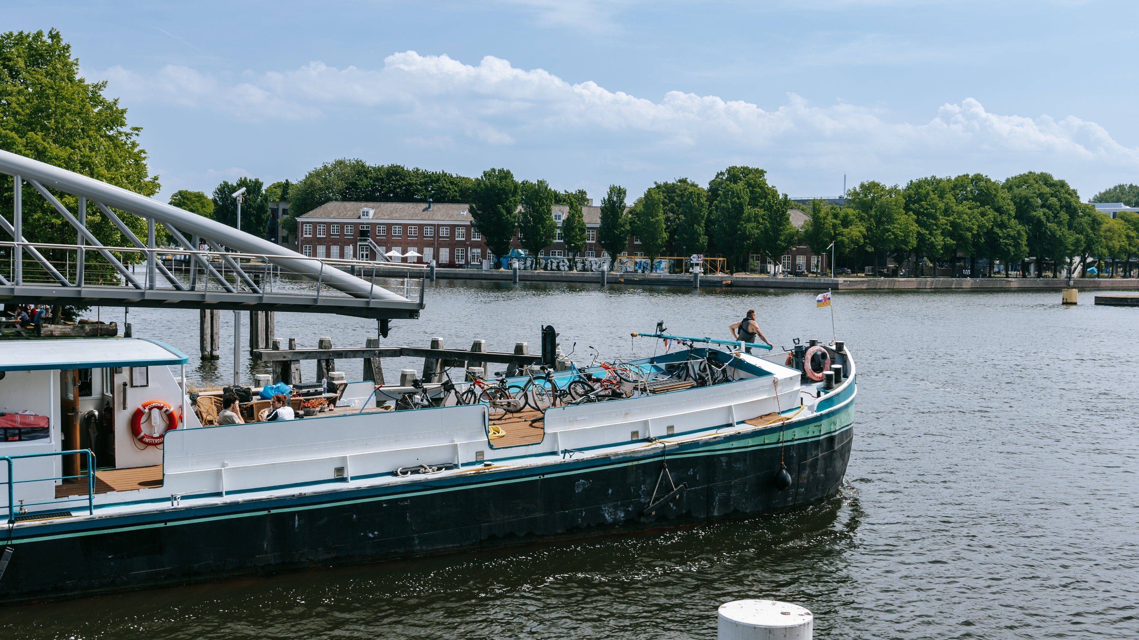 Nemo Science Museum which includes a bay or harbor and boating
