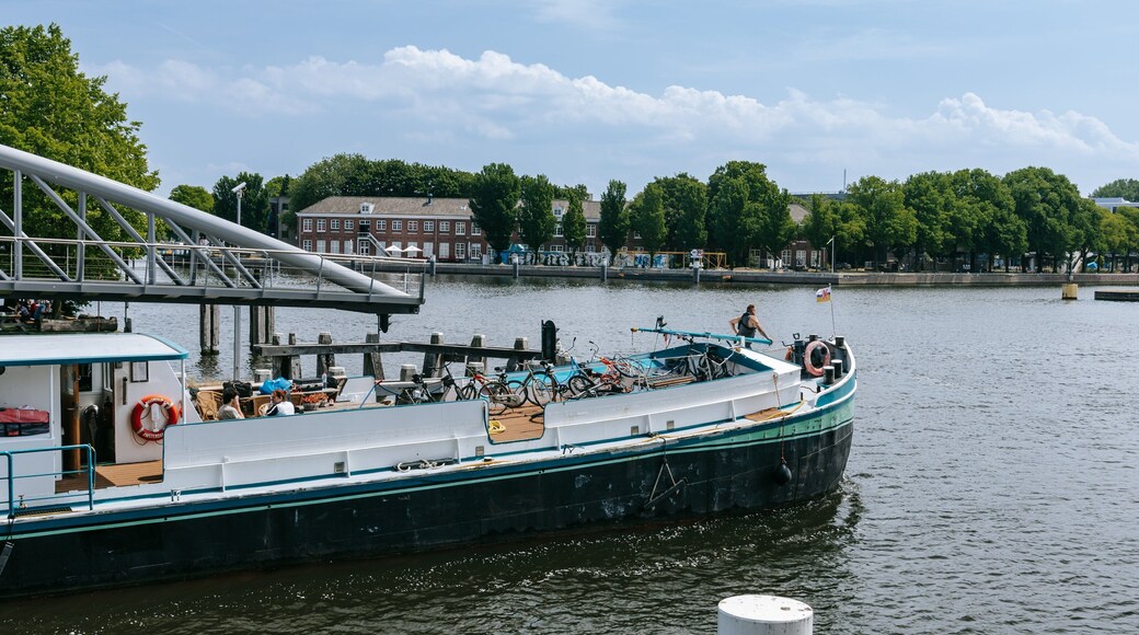 Nemo Science Museum which includes a bay or harbor and boating