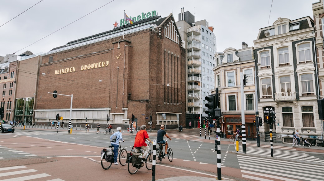 Heineken Experience showing street scenes, a city and cycling