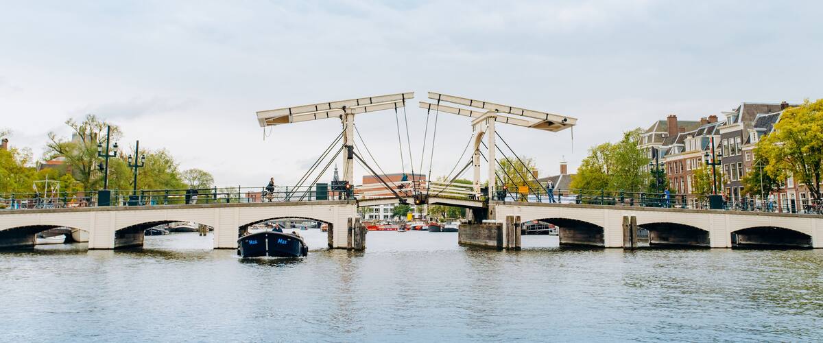 Amsterdam, Netherlands September 5, 2017: Magere Brug Bridge and Amstel river.