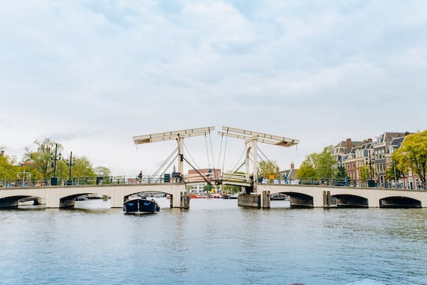 Amsterdam, Netherlands September 5, 2017: Magere Brug Bridge and Amstel river.