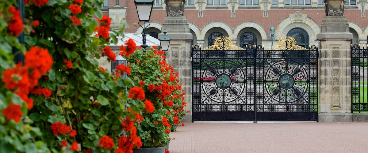 Peace Palace featuring château or palace, heritage architecture and flowers