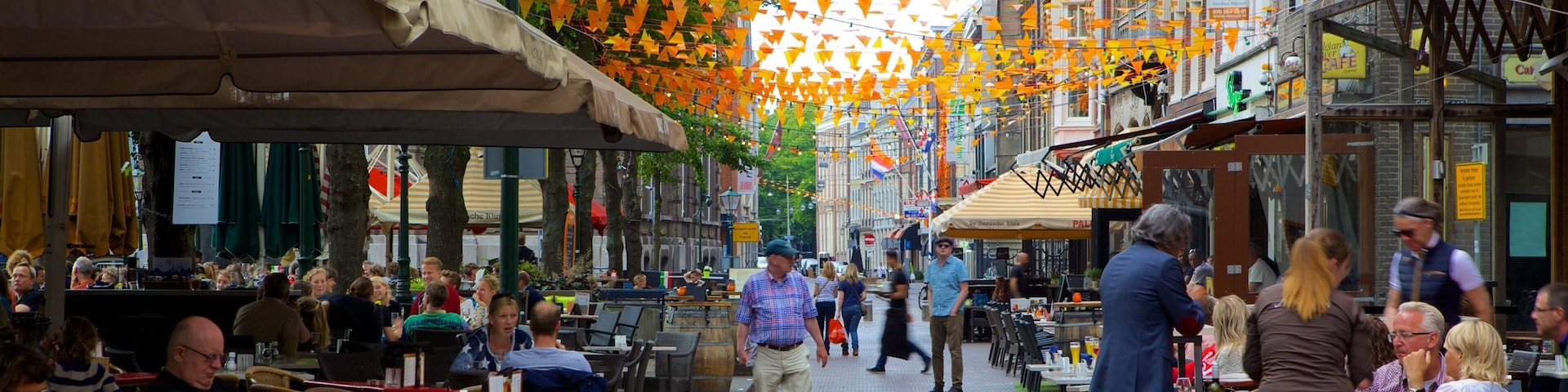 Plein mostrando imágenes de calles, comidas al aire libre y escenas de café
