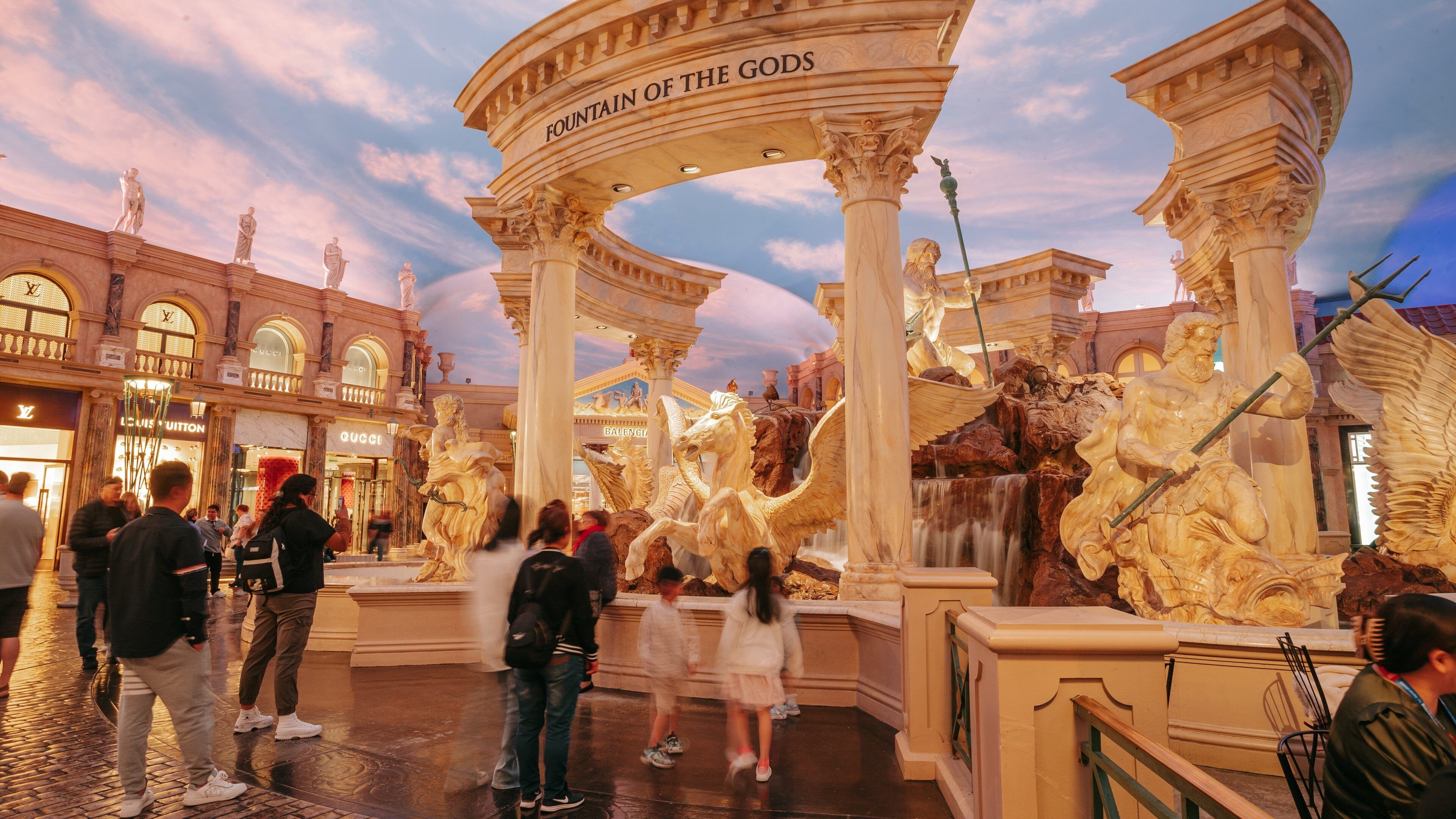 Forum Shops at Caesars featuring a fountain, interior views and heritage elements