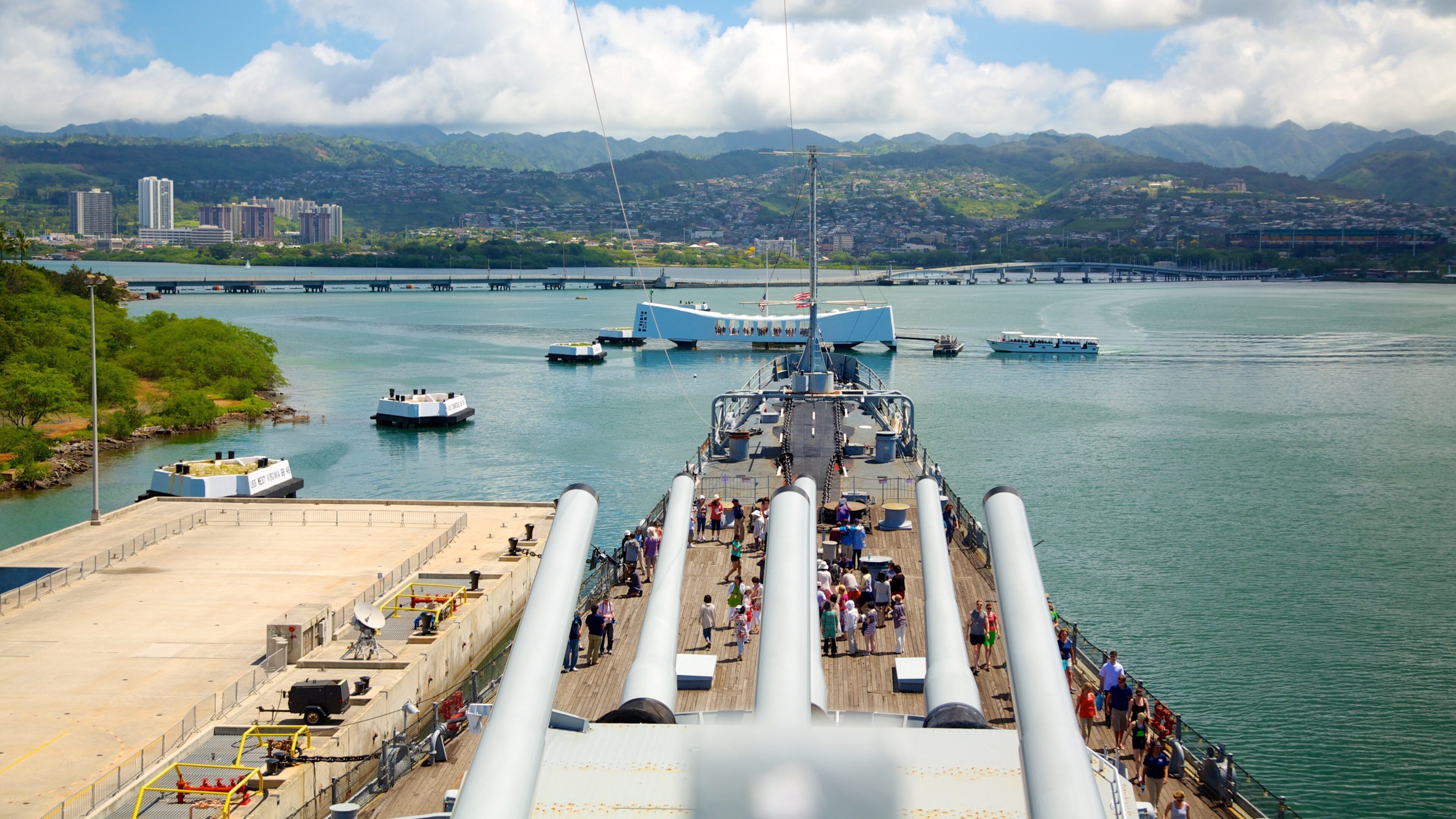 USS Missouri Memorial which includes general coastal views, a marina and military items