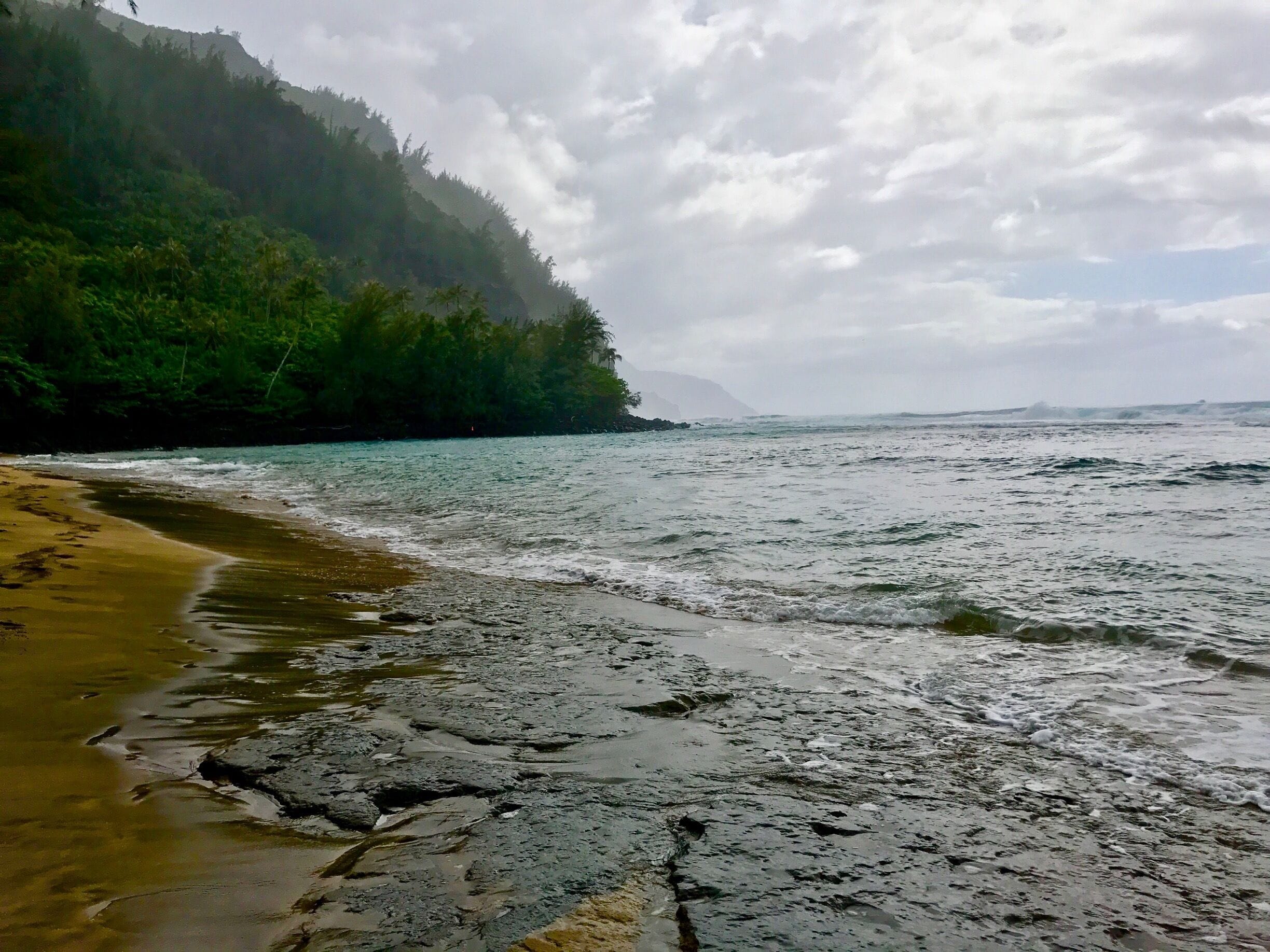 The northern most point of Kauai that is accessible by car. In the distance is the beginning of the Napoli Coast. This beach is well known for its surfing and the beginning to Kalalau Trail. 