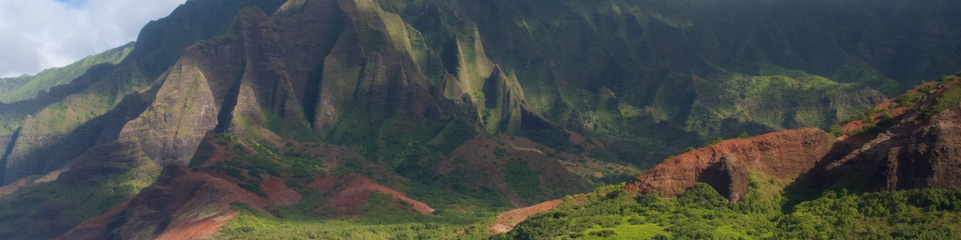 NaPali Coast State Park which includes mountains, general coastal views and landscape views