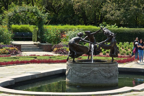 Conservatory Garden featuring a garden, outdoor art and a fountain