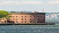 Governors Island featuring a bay or harbor and heritage architecture