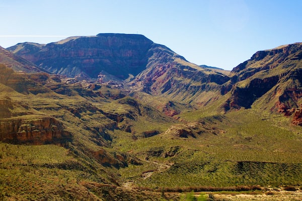 I took this photo at the Virgin River Gorge. In northwest Arizona, USA. This is right off of highway Interstate 15. I was on my way to Zion National Park in Utah when we came upon the Virgin River Gorge. And to tell the truth, when looking through my photos, I didn't even know what it was. I had to do some research later on to find out.
And more information: Virgin River Gorge is a long canyon that has been carved out by the Virgin River in northwest Arizona. The Virgin River rises on the Colorado Plateau and created the topography of both Zion National Park and the Virgin River Gorge. The Gorge connects the southwestern rim of the Colorado Plateau and the northeastern part of the Mojave Desert. Interstate 15 runs through the canyon and crosses the Virgin River several times. The Virgin River Gorge section of Interstate 15 is one of the most expensive parts of interstate highway ever constructed. Due to the winding of the canyon, the highway within is also noted for its tricky driving conditions.