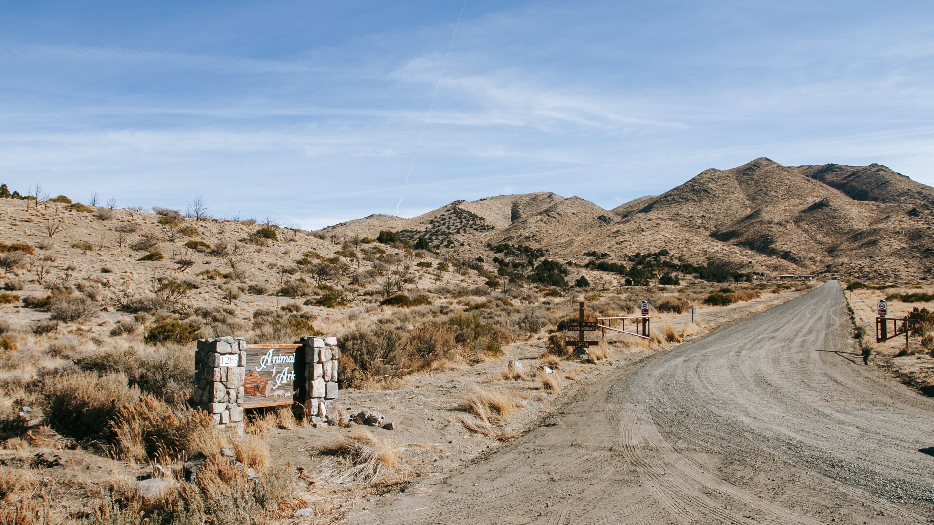 Animal Ark which includes signage and desert views