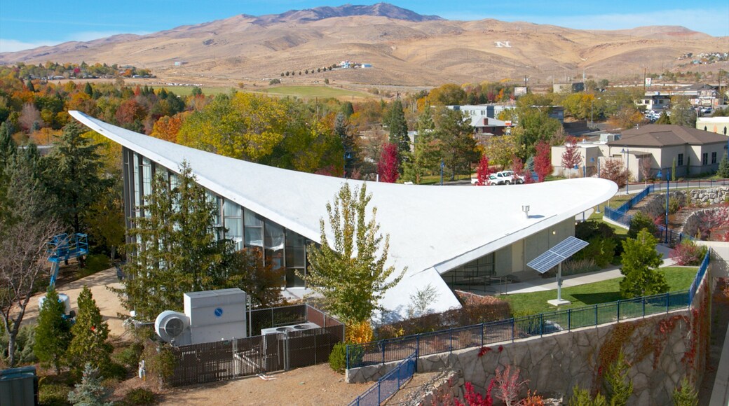 Fleischmann Planetarium and Science Center which includes modern architecture and autumn leaves
