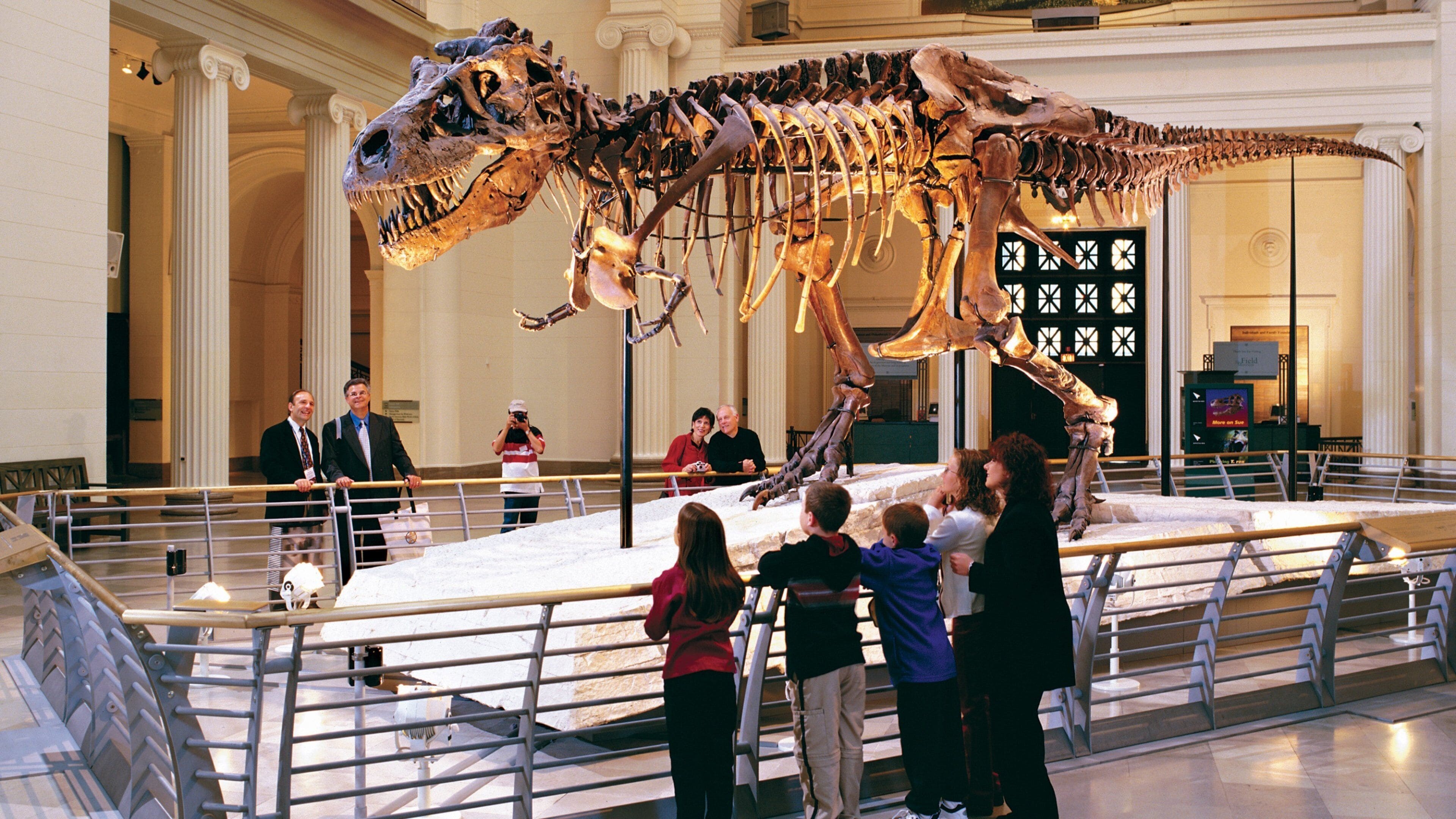 Field Museum of Natural History featuring interior views and heritage elements as well as a family