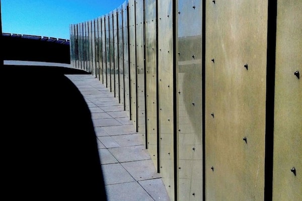 #Architecture The Nightingale rooftop of the Museum of Art. This modern structure situated along Liberty Street in Reno, Nevada was one of the first few buildings that immediately favoured my wandering eyes when I first visited Reno. It is designed by award winning architecture practitioner Will Bruder, based in Phoenix Arizona. His inspiration with this building in the form of sculptural art is referenced from the Black Rock Desert located in Northwestern Nevada and Northwestern Great Basin, where The National historic emigrant trails can be traced and the venue of the annual event called Burning man festival.
