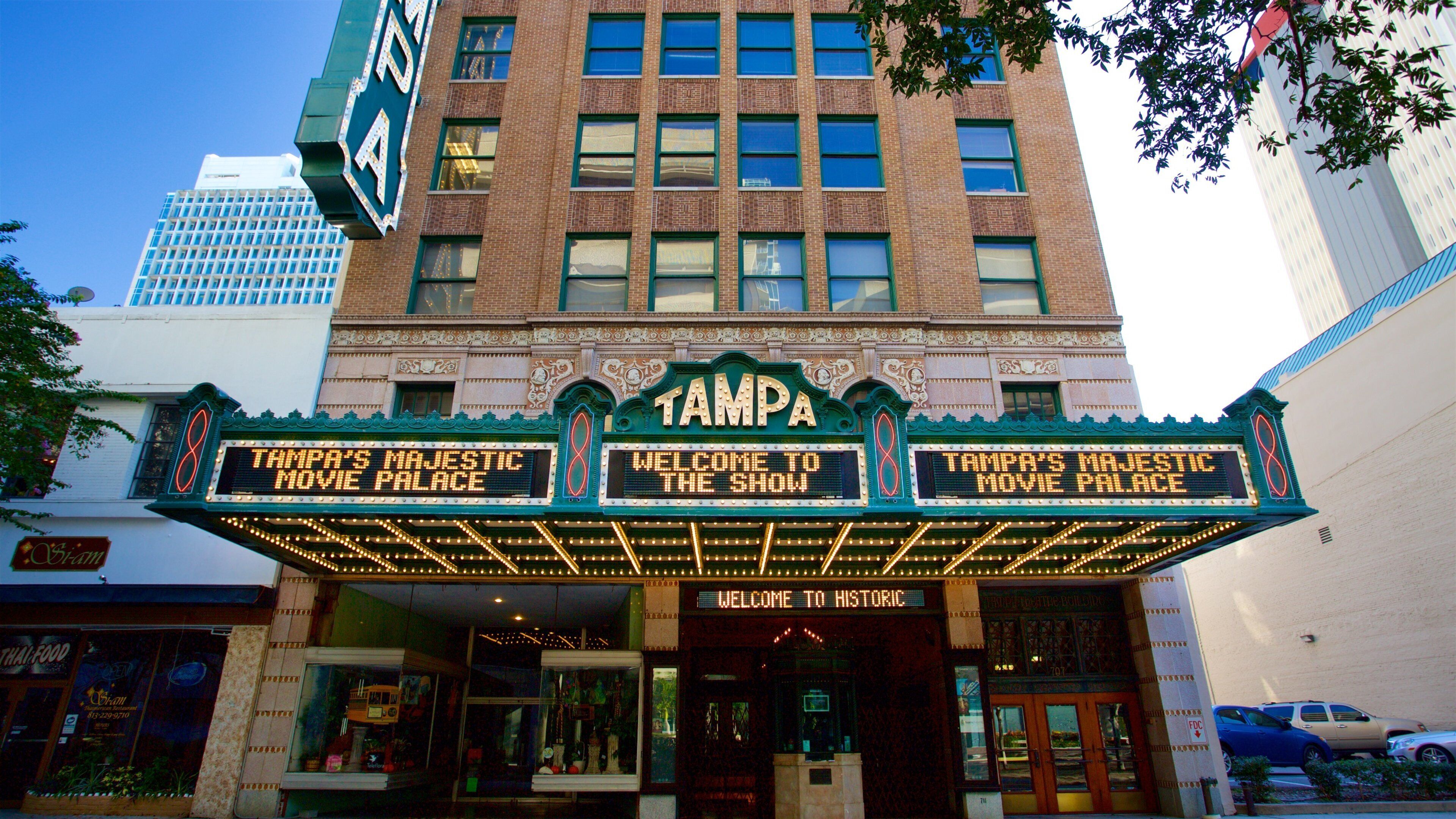Tampa Theater featuring a city and signage