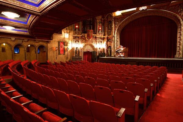 Tampa Theater which includes heritage architecture and theater scenes