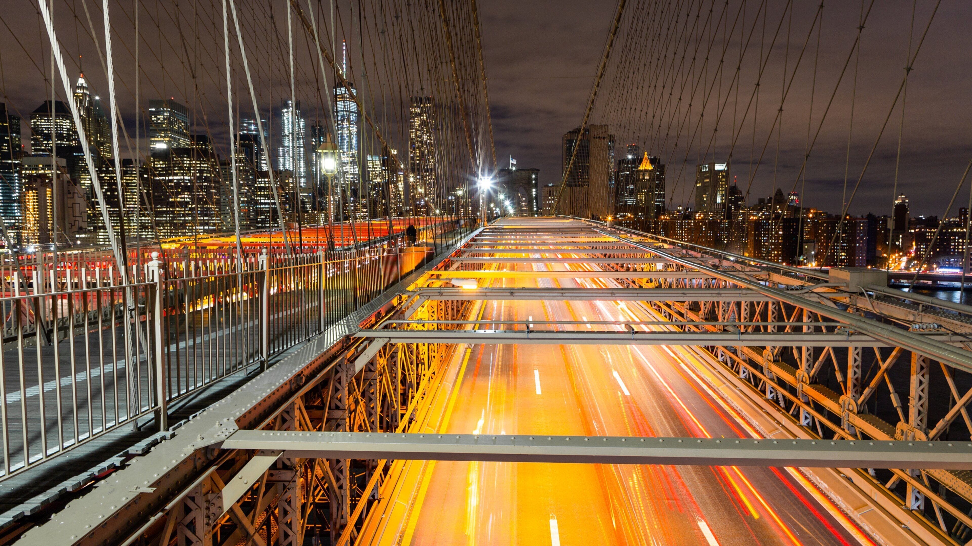 Brooklyn Bridge featuring night scenes, a city and landscape views