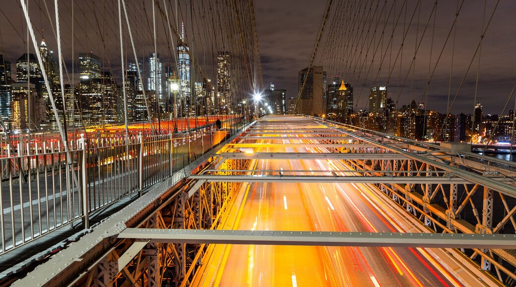 Brooklyn Bridge featuring night scenes, a city and landscape views