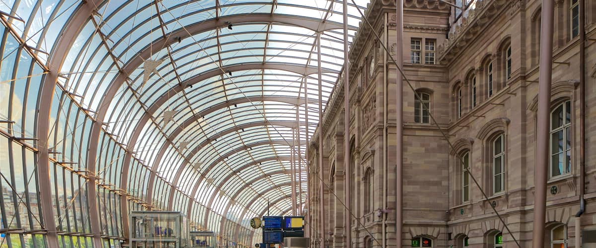 Train Station Square which includes modern architecture and interior views