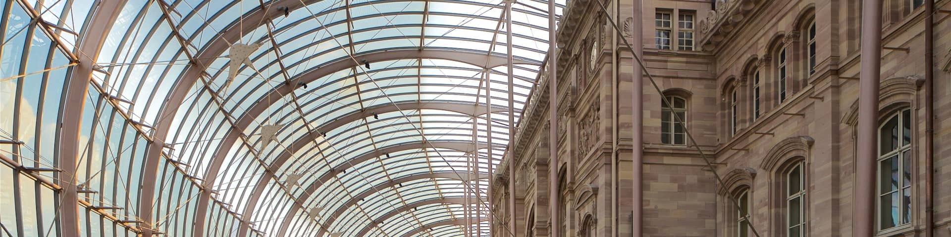 Train Station Square which includes modern architecture and interior views