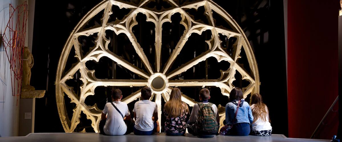 Aquitaine Museum featuring interior views as well as a small group of people