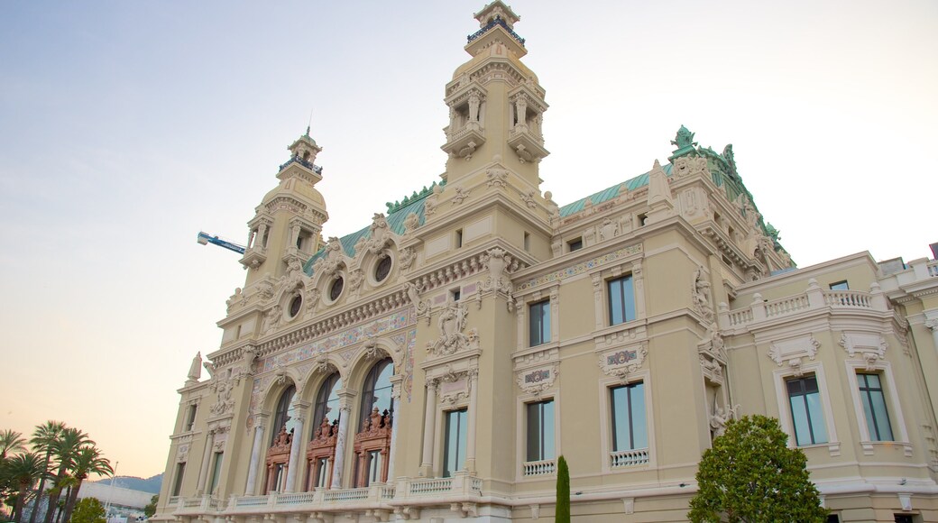 Salle Garnier Opera House which includes a sunset and heritage architecture