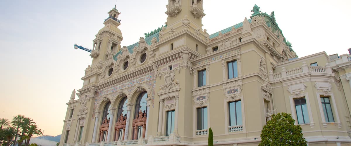 Salle Garnier Opera House which includes a sunset and heritage architecture