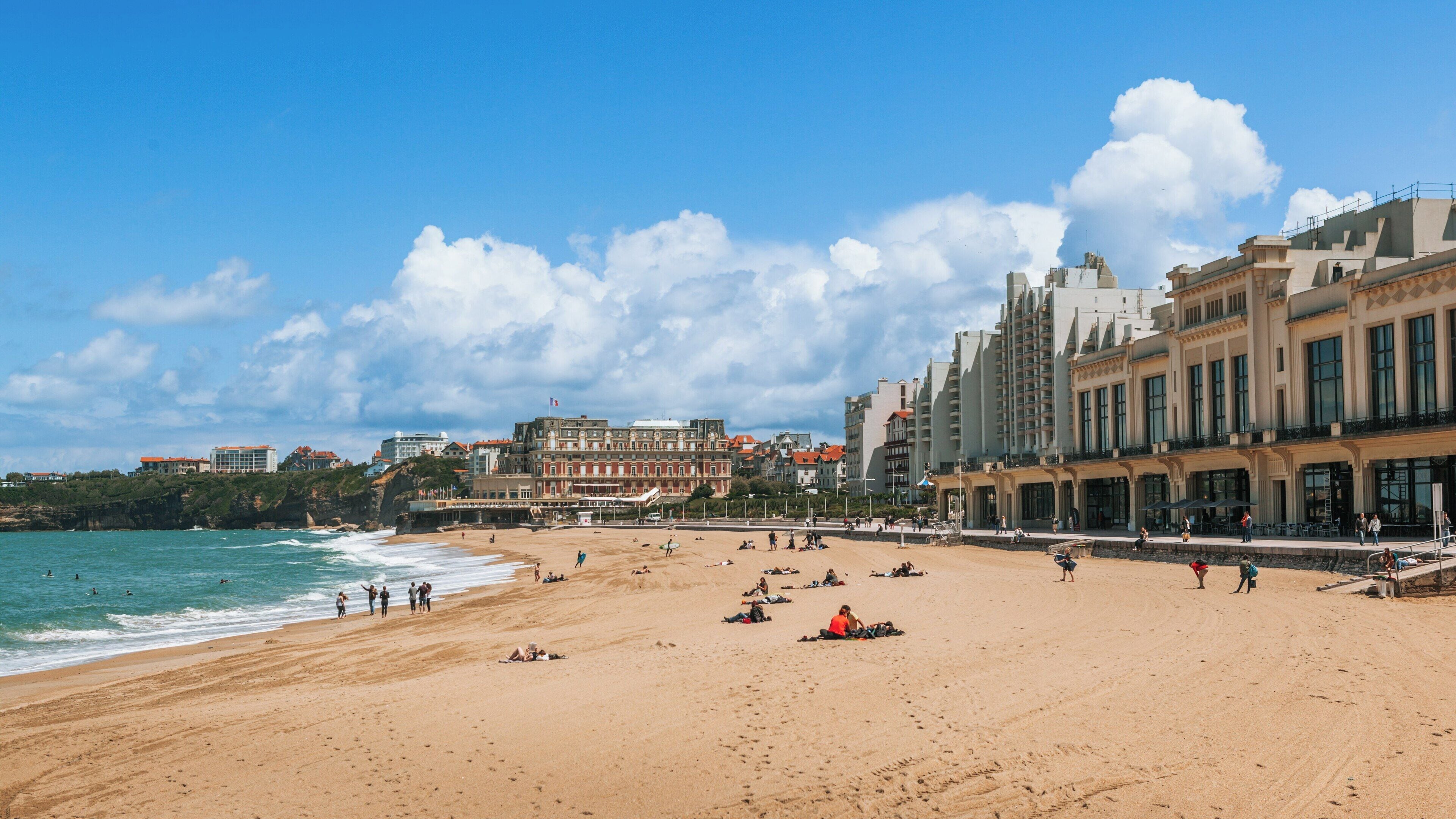 Beautiful Grand Beach in Biarritz City Centre attracts visitors and locals for relaxation and leisure on a sunny day