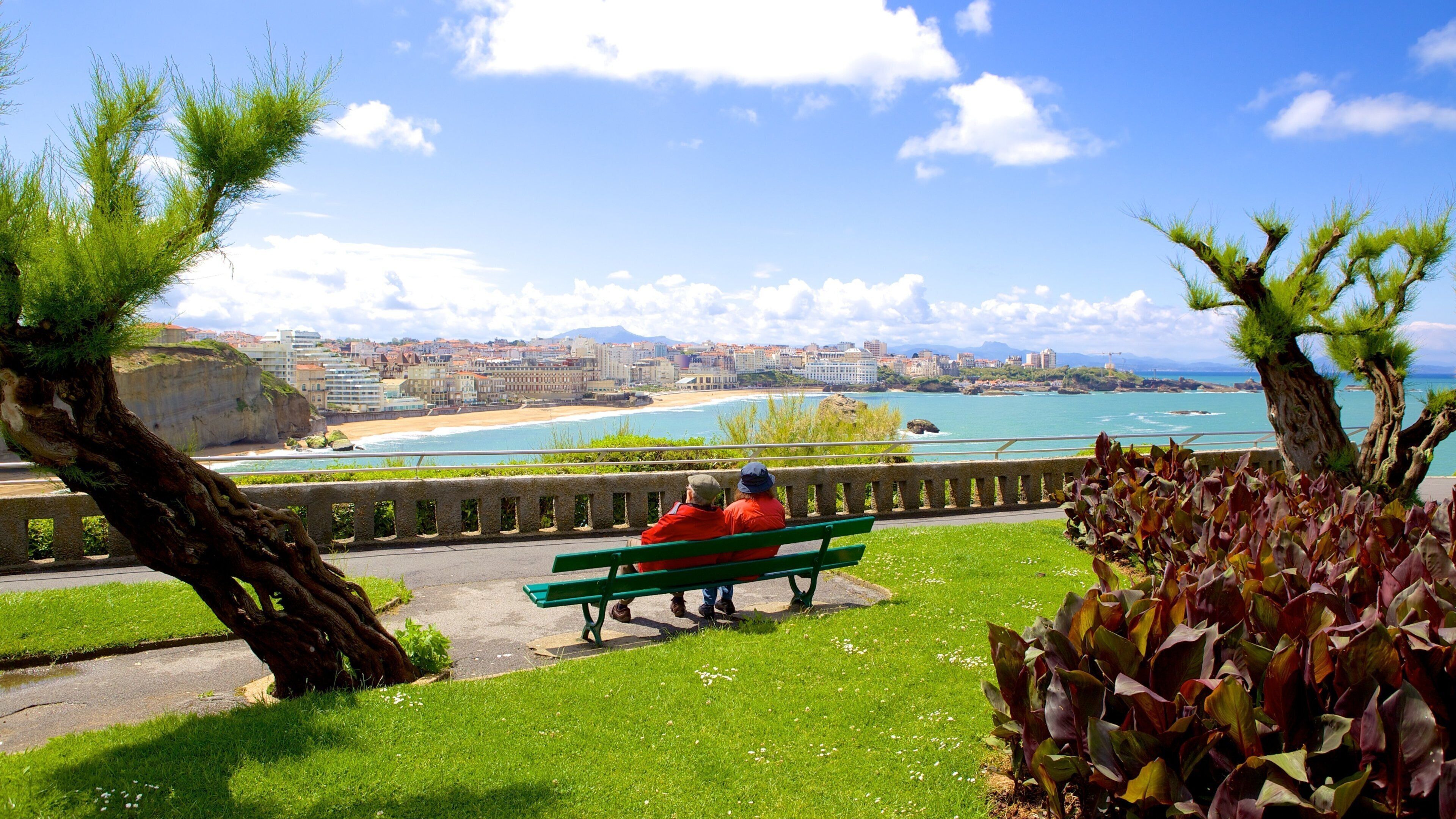 Biarritz Lighthouse featuring a garden and views as well as a couple
