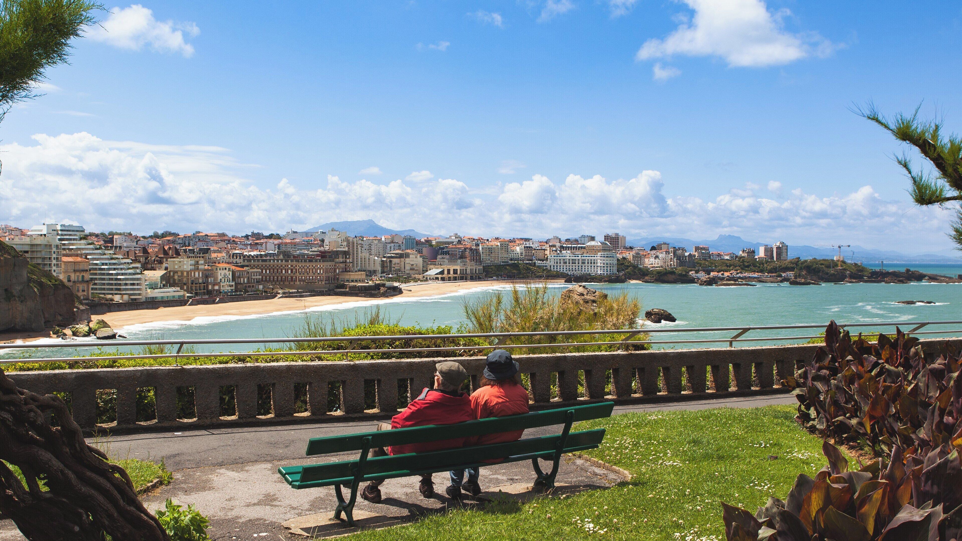 Biarritz Lighthouse stands elegantly against the backdrop of the stunning coastline in Nouvelle-Aquitaine, France, attracting locals and tourists alike