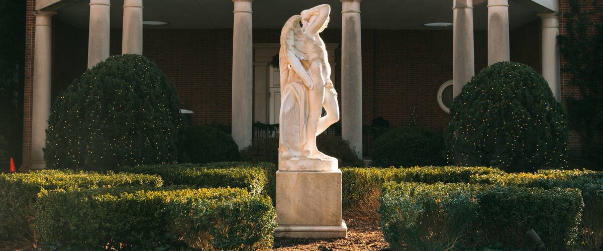 Hillwood Estate, Museum & Gardens which includes a statue or sculpture and a garden