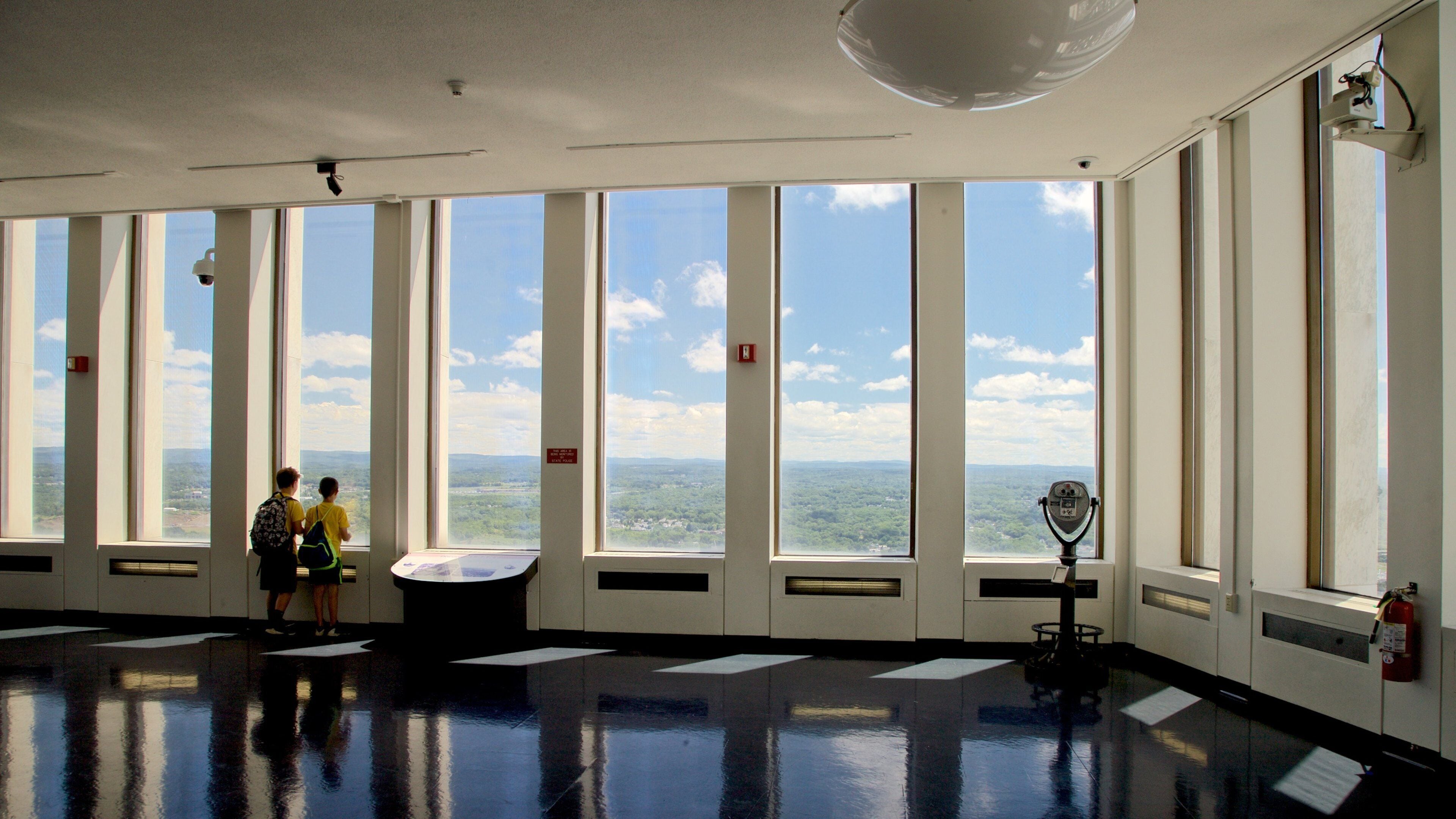 Corning Tower featuring interior views and views as well as children