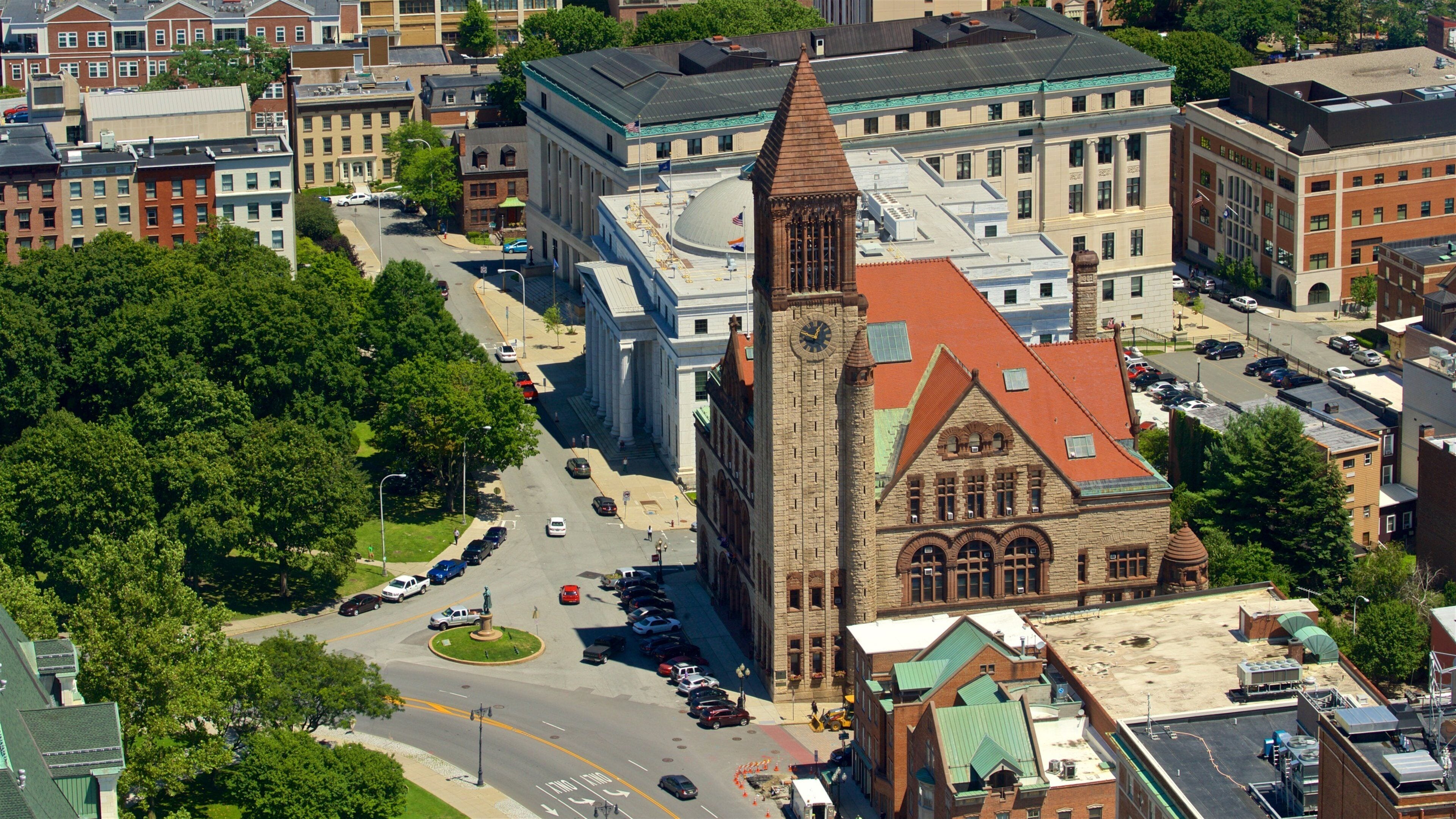 Corning Tower which includes heritage architecture, landscape views and a city