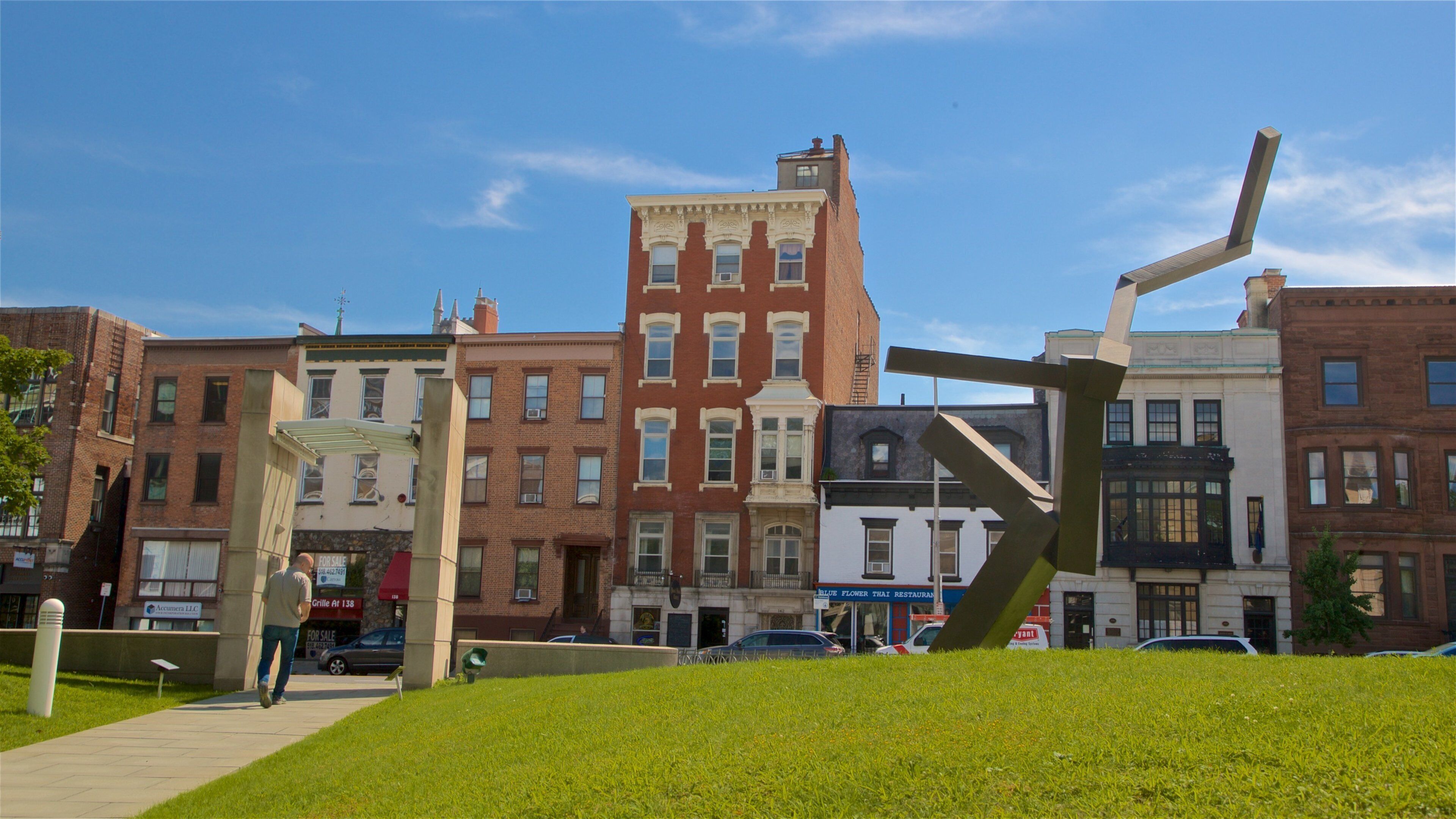Albany Institute of History and Art featuring a garden and outdoor art