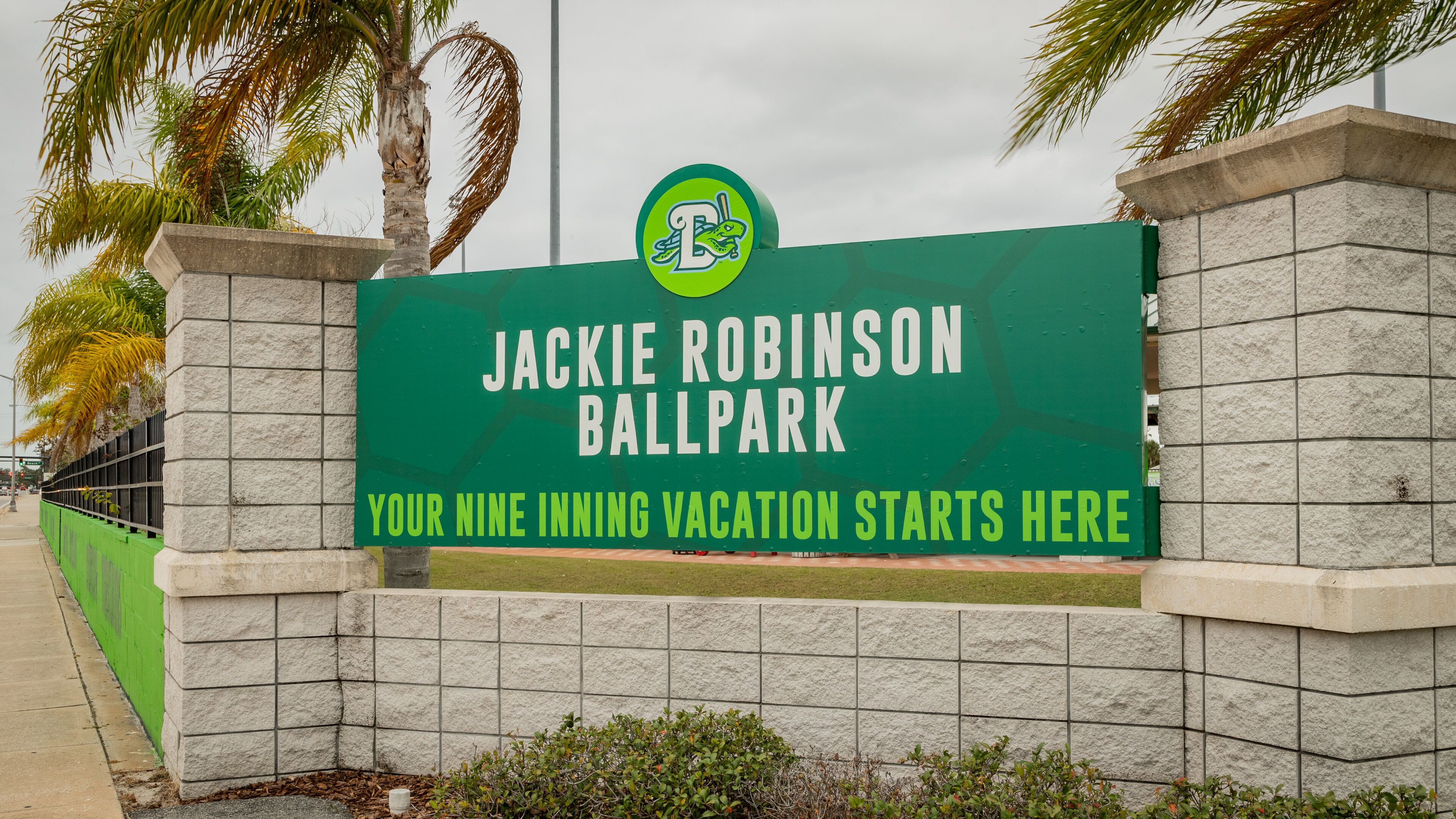Jackie Robinson Ballpark and Statue featuring signage