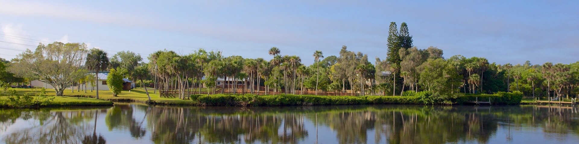 Manatee Park featuring a lake or waterhole and a garden
