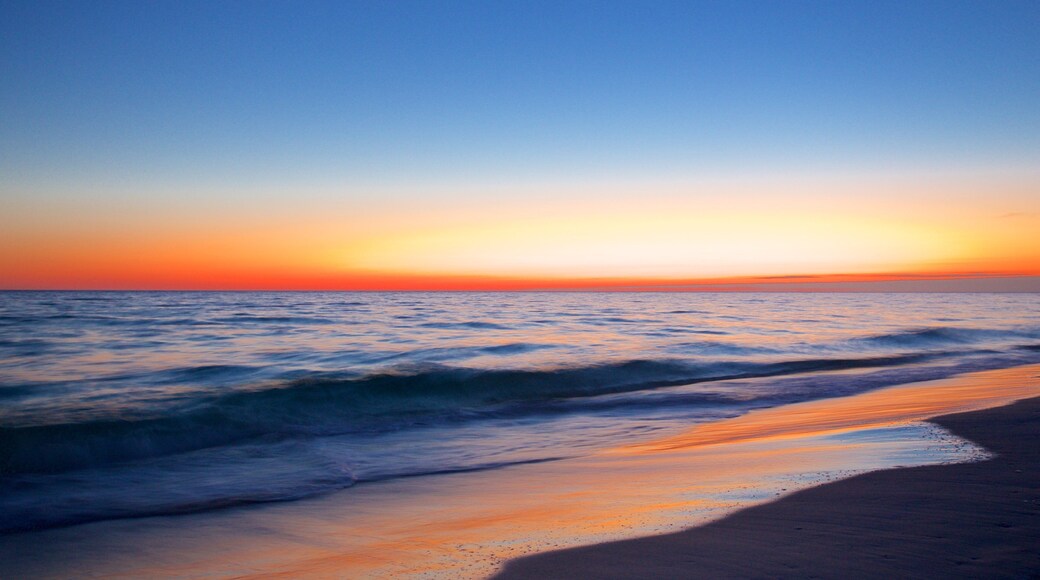 Okaloosa Island showing a sunset and a sandy beach