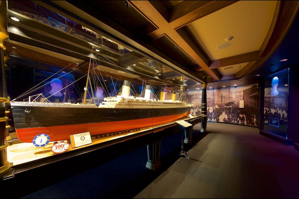 A model of a large ship displayed in a museum.