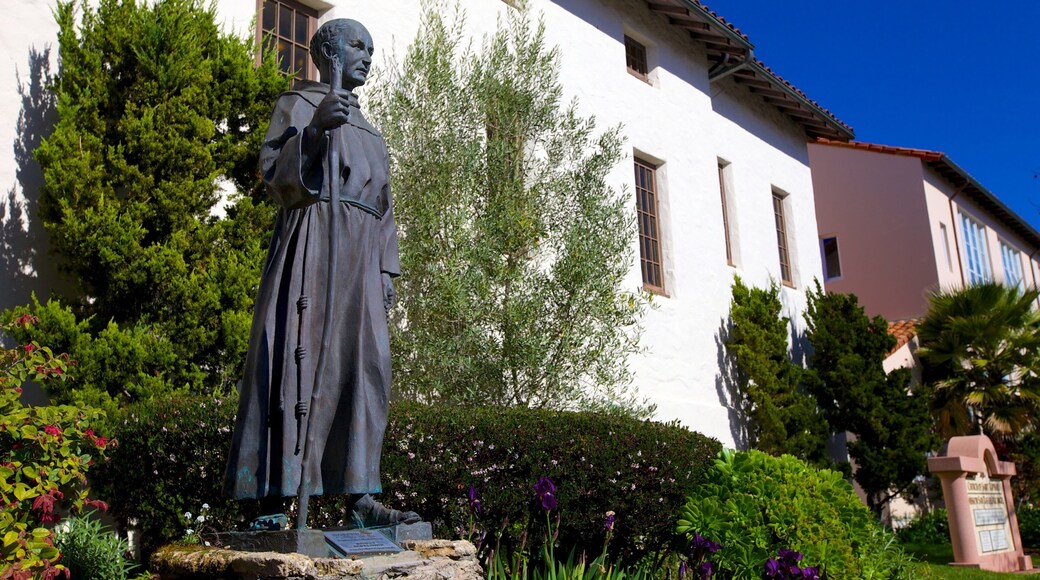 Mission San Rafael Arcangel featuring a statue or sculpture