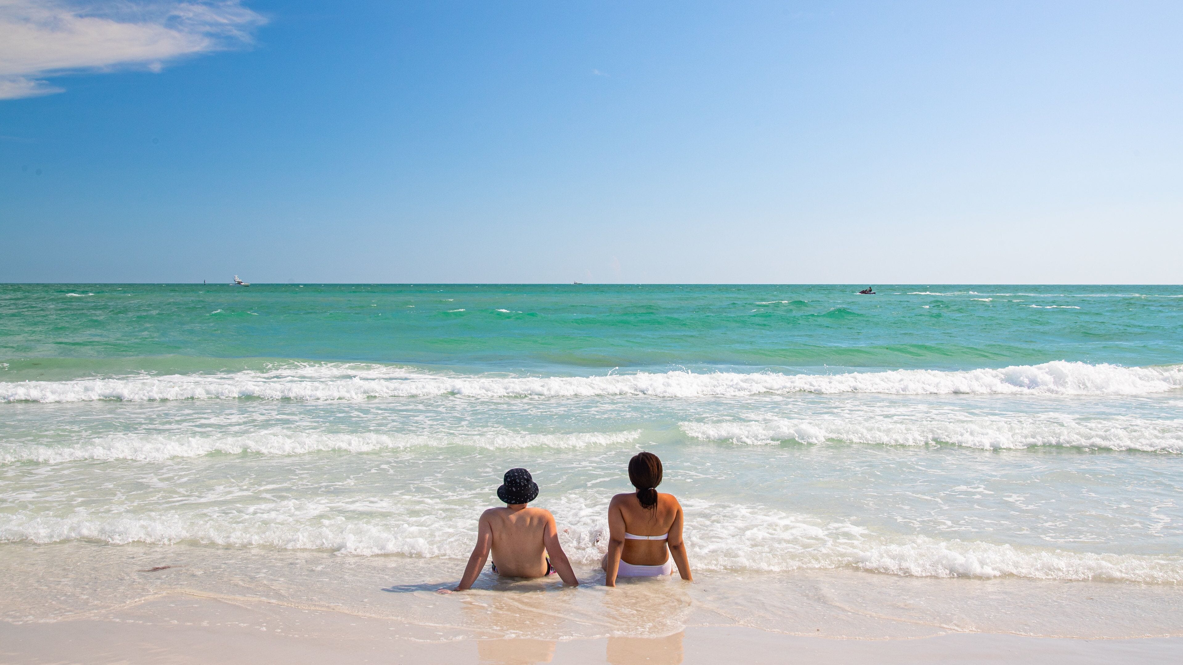 Siesta Key Beach featuring general coastal views as well as a couple