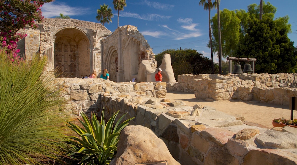 Mission San Juan Capistrano which includes landscape views and heritage architecture