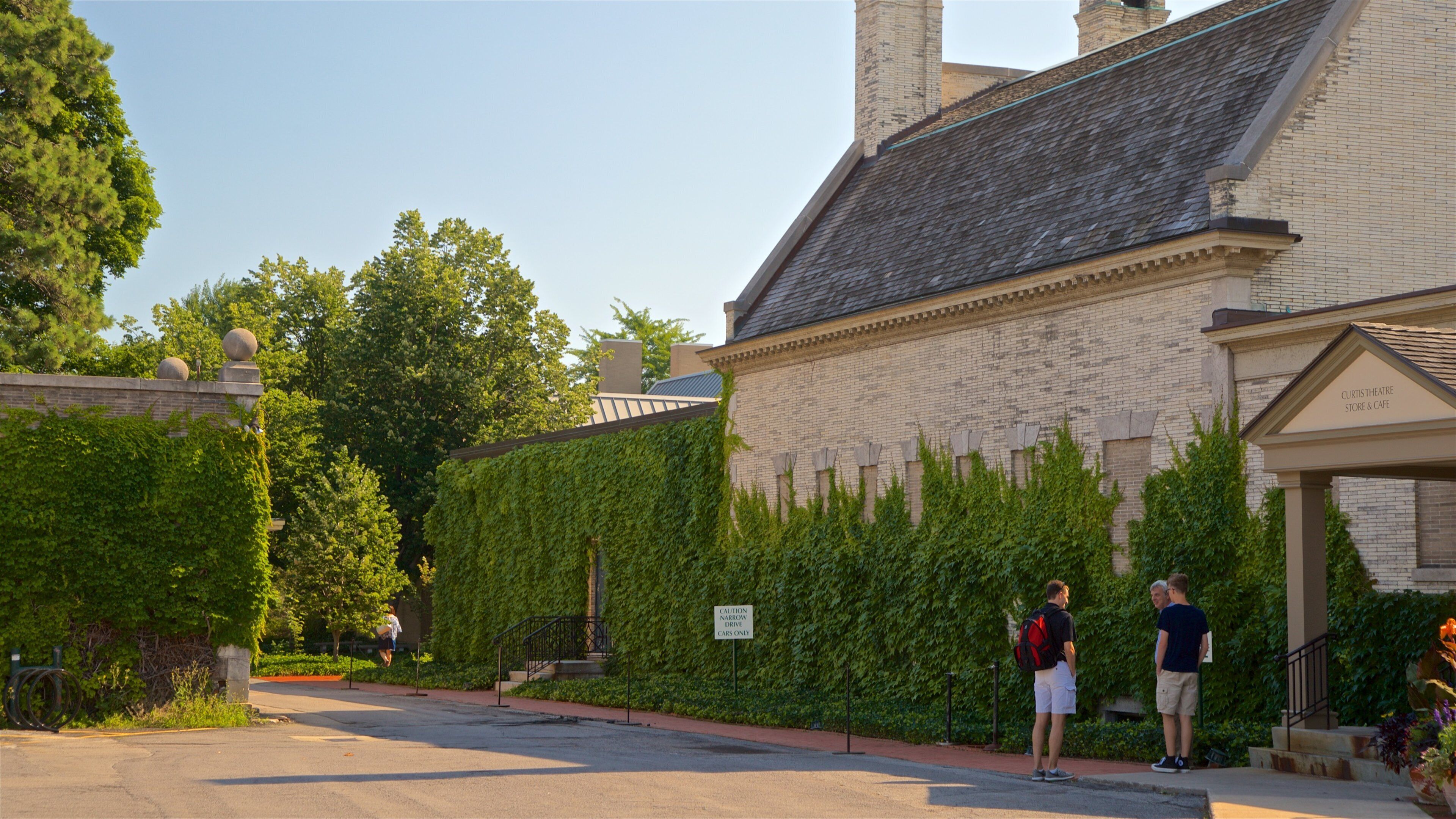 George Eastman House which includes street scenes as well as a small group of people