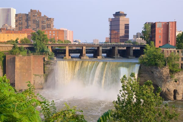 Genesee River\'s High Falls featuring a bridge, a river or creek and a city