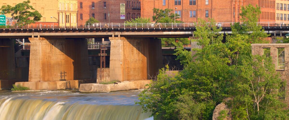 Genesee River\'s High Falls featuring a river or creek, a bridge and a cascade