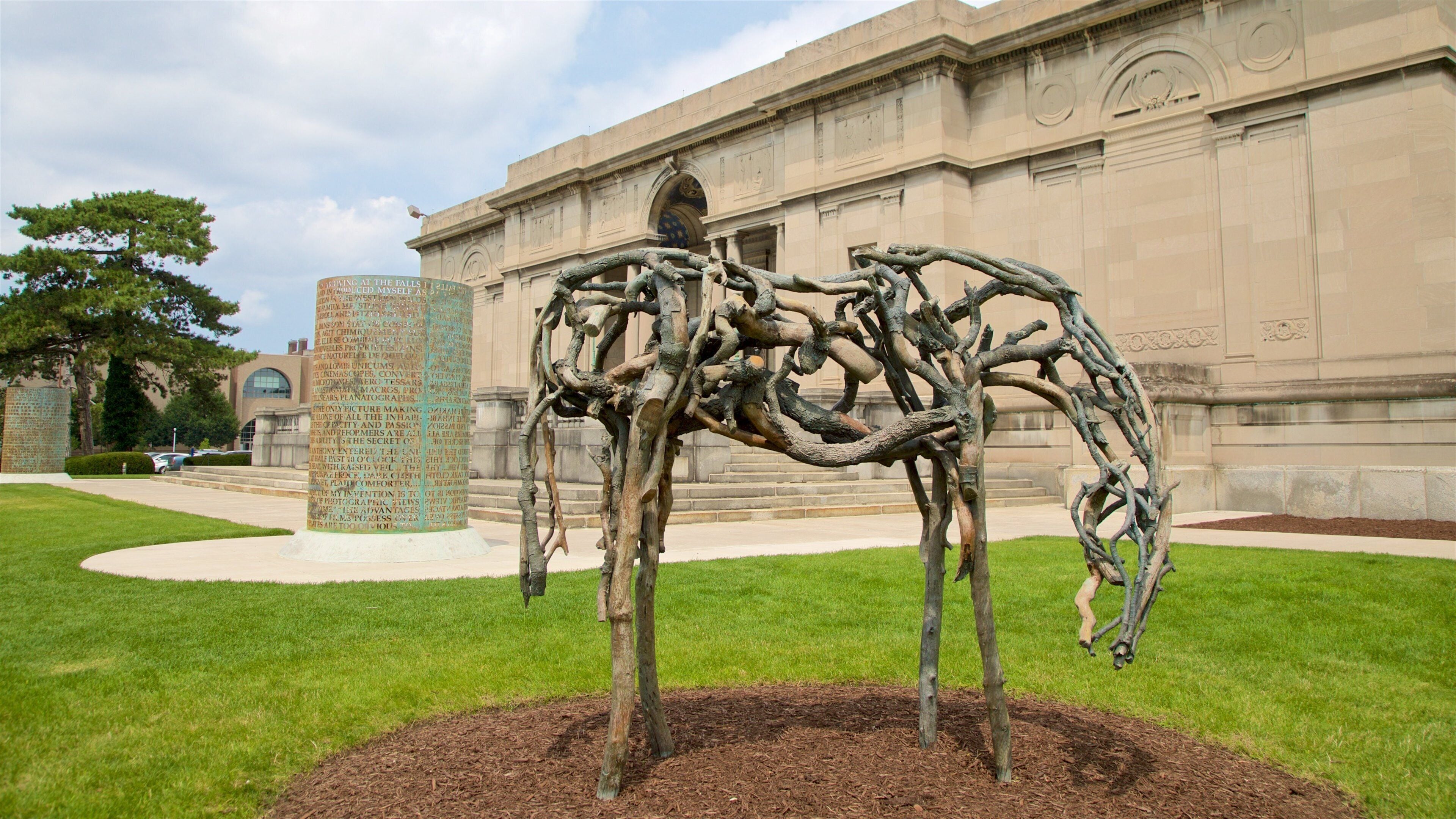 Memorial Art Gallery showing outdoor art, heritage architecture and a garden